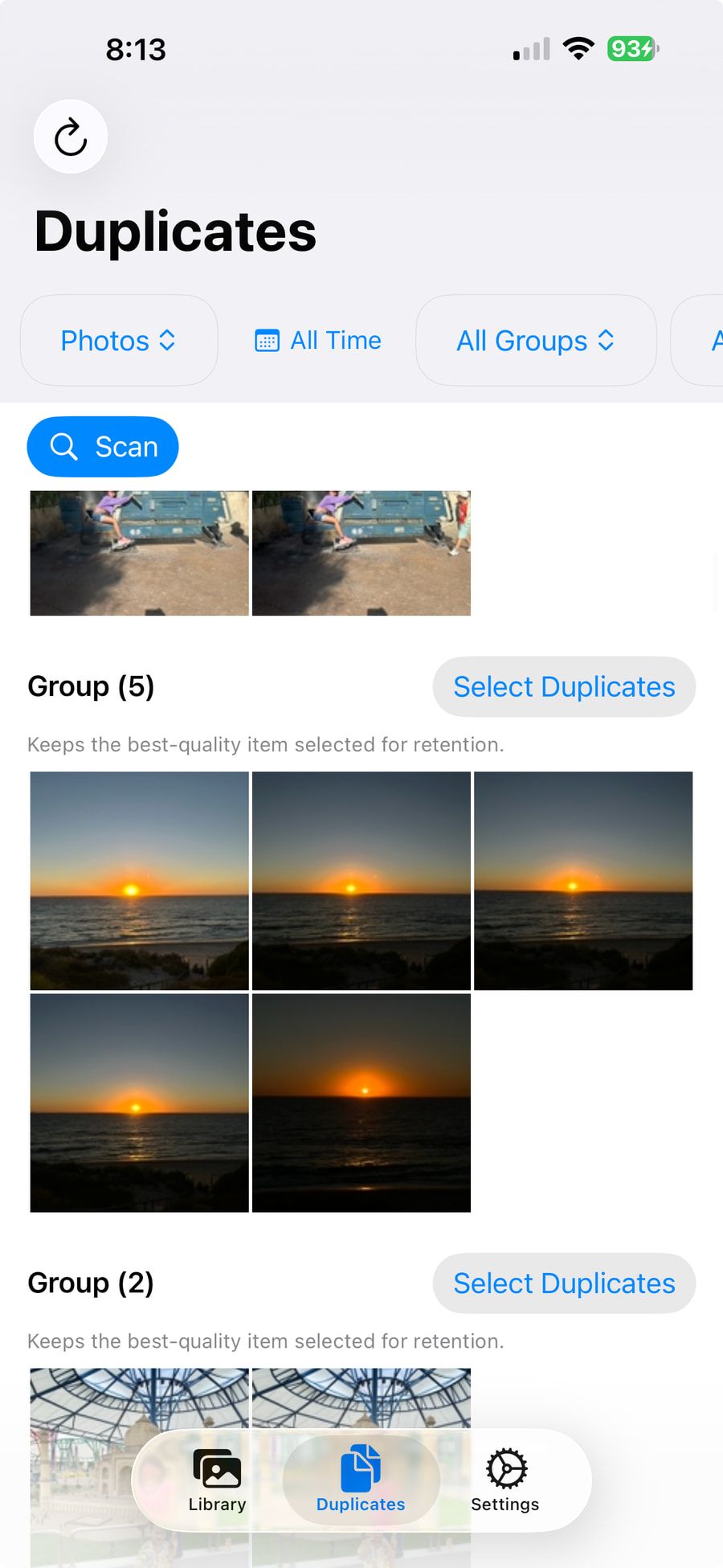 PhotoDeDupe’s Duplicates screen, showing a group of five similar sunset photos with a Select Duplicates button.